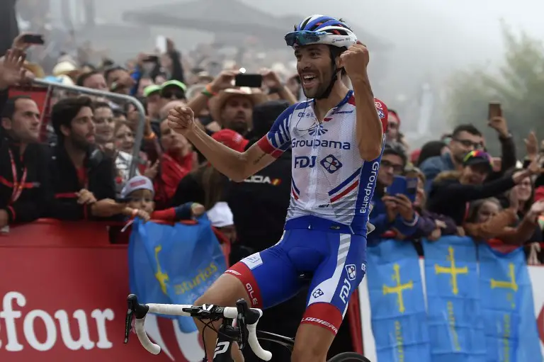 Groupama-FDJ's French cyclist Thibaut Pinot celebrates after winning the 15th stage of the 73rd edition of "La Vuelta" Tour of Spain cycling race, a 178.2 km route from Ribera de Arriba to Lakes of Covadonga near Cangas de Onis on September 9, 2018. (Photo by Miguel RIOPA / AFP)