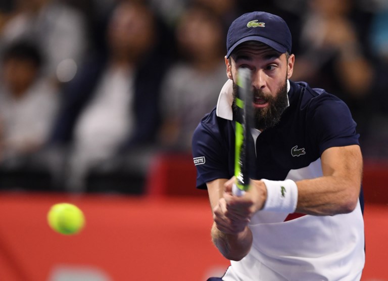 Benoit Paire of France hits a return during his men's singles second round match against Japan's Kei Nishikori at the Japan Open tennis championships in Tokyo on October 3, 2018. / AFP PHOTO / TOSHIFUMI KITAMURA