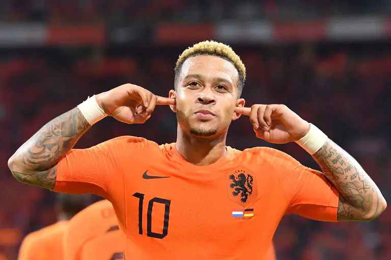 Netherlands' forward Memphis Depay celebrates after scoring a goal during the UEFA Nations League football match between Netherlands and Germany, on October 13, 2018 at Johan Crujiff ArenA in Amsterdam. (Photo by EMMANUEL DUNAND / AFP)