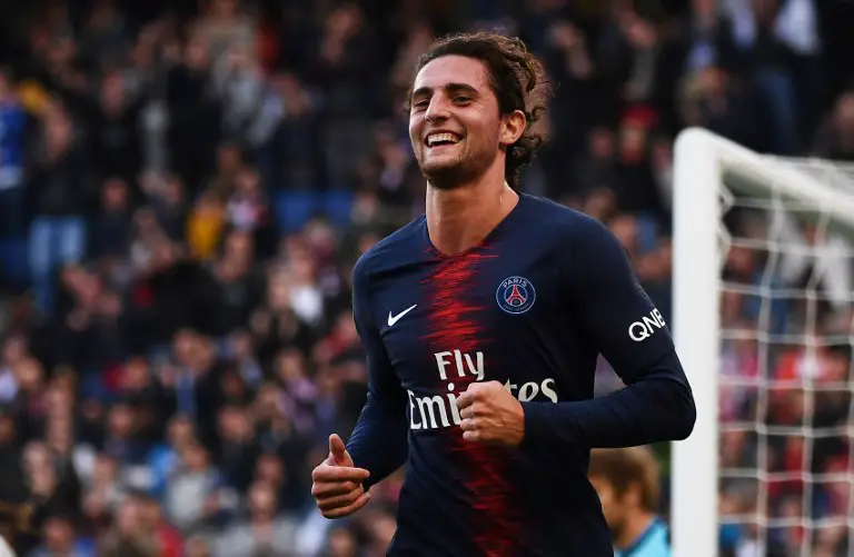 Paris Saint-Germain's French midfielder Adrien Rabiot celebrates after scoring his team's second goal during the French L1 football match between Paris Saint-Germain (PSG) and Amiens at the Parc des Princes stadium in Paris on October 20, 2018. (Photo by Anne-Christine POUJOULAT / AFP)