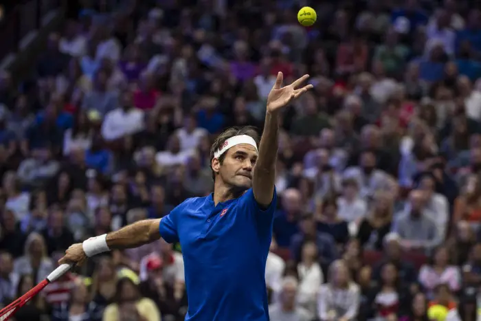 September 21, 2018 - Chicago, Illinois, U.S - Team Europe member ROGER FEDERER of Switzerland serves during the first doubles match on Day One of the Laver Cup at the United Center in Chicago, Illinois.