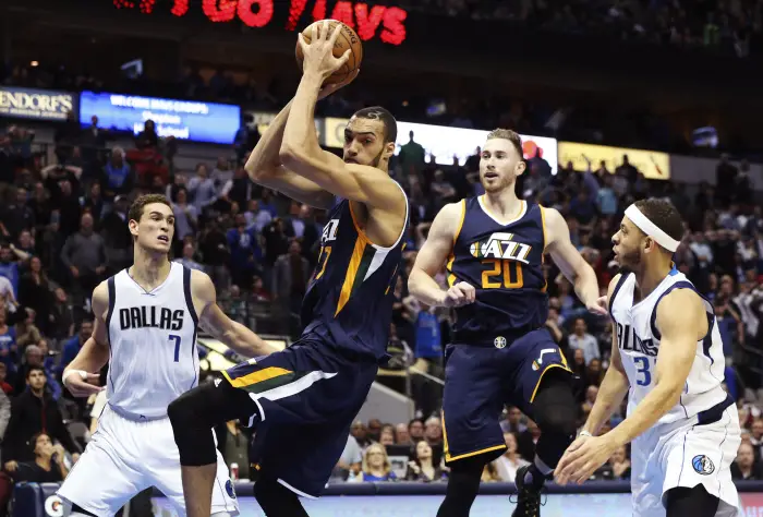 Jan 20, 2017; Dallas, TX, USA; Utah Jazz center Rudy Gobert (27) grabs a rebound during the game against the Dallas Mavericks at American Airlines Center.