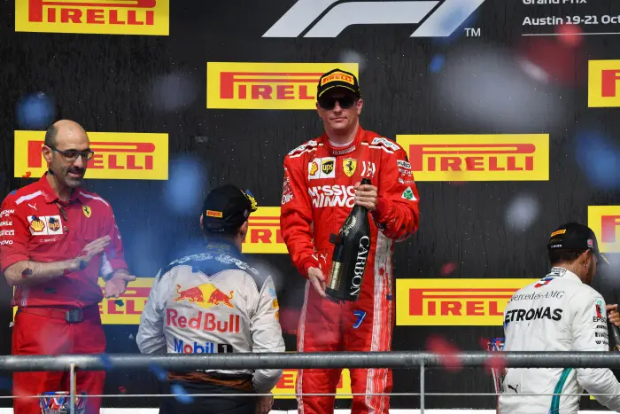 (L to R): Max Verstappen, Red Bull Racing, Carlo Santi, Ferrari Race Engineer, Race Winner Kimi Raikkonen, Ferrari and Lewis Hamilton, Mercedes AMG F1 celebrate on the podium with the champagne at Formula One World Championship, Rd18, United States Grand Prix, Race, Circuit of the Americas, Austin, Texas, USA, Sunday 21 October 2018.