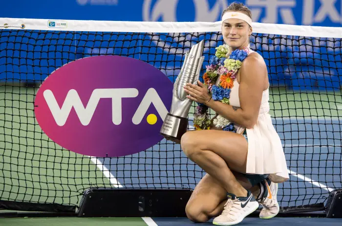 WUHAN, Sept. 29, 2018 Aryna Sabalenka of Belarus poses during the trophy ceremony after winning the singles final match against Anett Kontaveit of Estonia at the 2018 WTA Wuhan Open tennis tournament in Wuhan, central China's Hubei Province, on Sept. 29, 2018. Aryna Sabalenka won 2-0 and claimed the title.