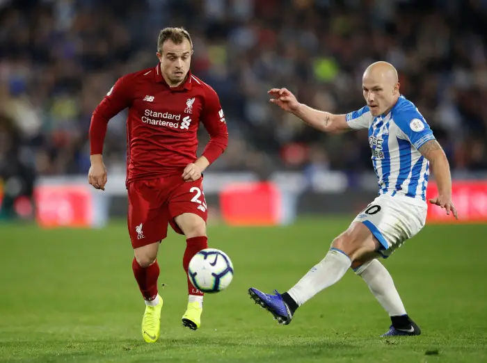 Liverpool's Xherdan Shaqiri in action with Huddersfield Town's Aaron Mooy