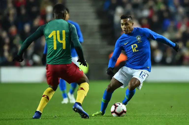 Cameroon's midfielder Georges Mandjeck (L) vies with Brazil's defender Alex Sandro during the international friendly football match between Brazil and Cameroon at Stadium MK in Milton Keynes, central England, on November 20, 2018. (Photo by Glyn KIRK / AFP)