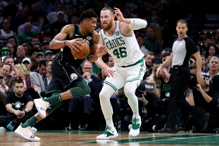 BOSTON, MA - NOVEMBER 1: Giannis Antetokounmpo #34 of the Milwaukee Bucks drives against Aron Baynes #46 of the Boston Celtics during the game between the Boston Celtics and the Milwaukee Bucks at TD Garden on November 1, 2018 in Boston, Massachusetts.   Maddie Meyer/Getty Images/AFP