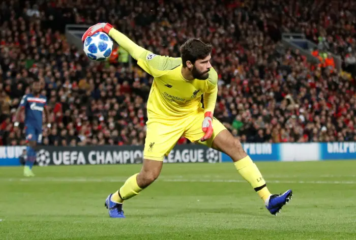 Liverpool's Alisson in action