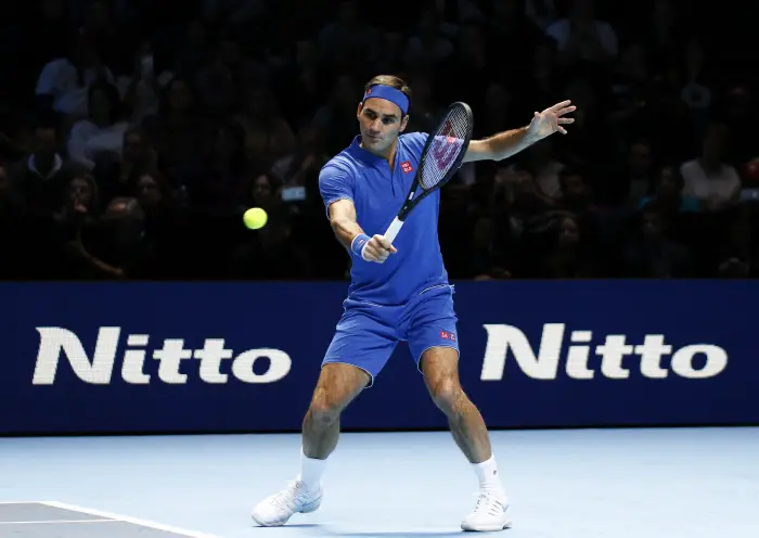 11th November 2018, O2 Arena, London, England; Nitto ATP Tennis Finals; Roger Federer (SUI) plays a backhand shot in his match against Kei Nishikori (JPN)