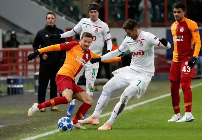 Soccer Football - Champions League - Group Stage - Group D - Lokomotiv Moscow v Galatasaray - RZD Arena, Moscow, Russia - November 28, 2018  Galatasaray's Martin Linnes in action with Lokomotiv Moscow's Grzegorz Krychowiak