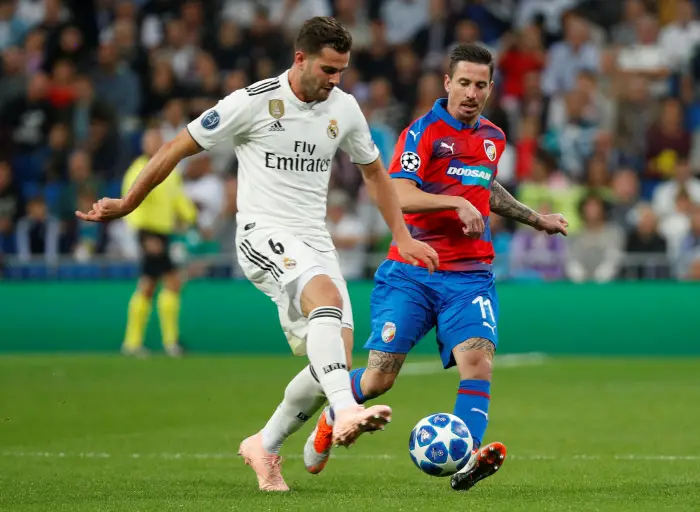 Soccer Football - Champions League - Group Stage - Group G - Real Madrid v Viktoria Plzen - Santiago Bernabeu, Madrid, Spain - October 23, 2018  Real Madrid's Nacho in action with Viktoria Plzen's Milan Petrzela