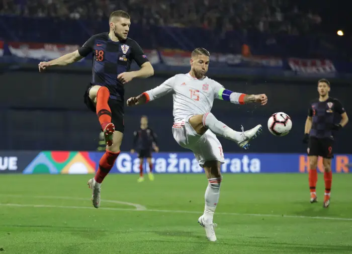 Spain's Sergio Ramos in action with Croatia's Ante Rebic