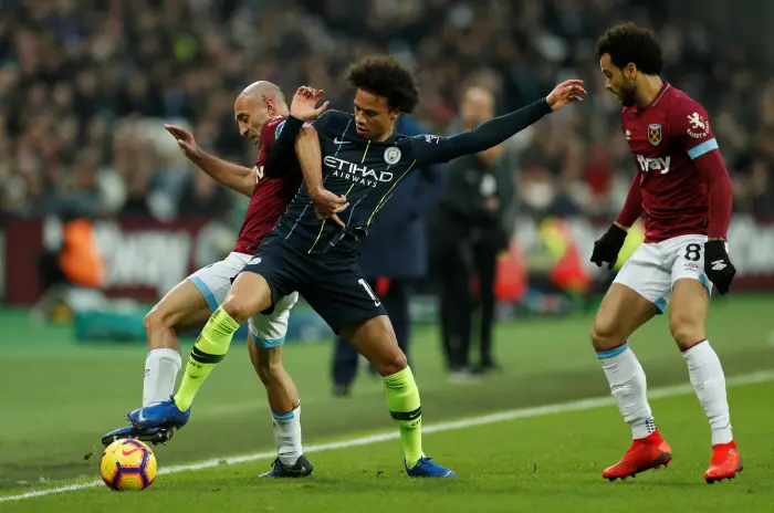 Soccer Football - Premier League - West Ham United v Manchester City - London Stadium, London, Britain - November 24, 2018  West Ham's Pablo Zabaleta and Felipe Anderson in action with Manchester City's Leroy Sane