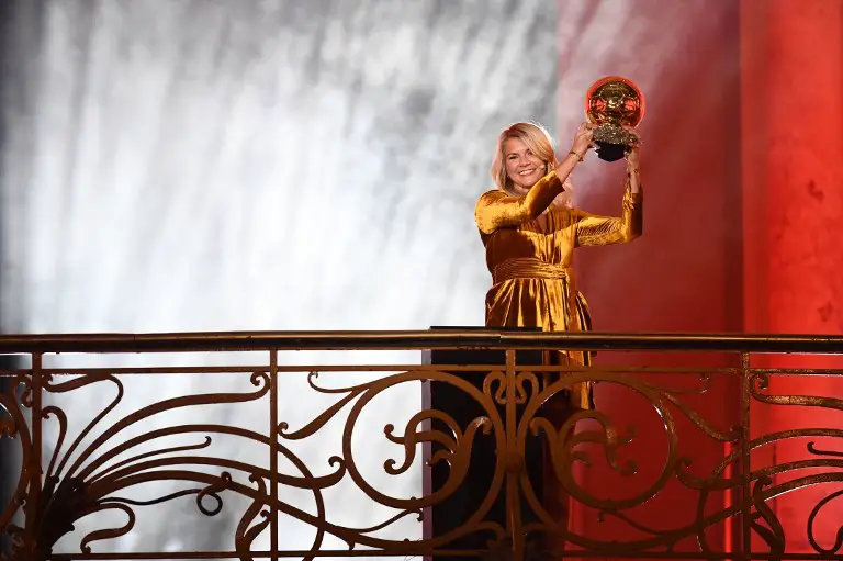 Olympique Lyonnais' Norwegian forward Ada Hegerberg brandishes her trophy after receiving the 2018 FIFA Women's Ballon d'Or award for best player of the year during the 2018 FIFA Ballon d'Or award ceremony at the Grand Palais in Paris on December 3, 2018. - The winner of the 2018 Ballon d'Or will be revealed at a glittering ceremony in Paris on December 3 evening, with Croatia's Luka Modric and a host of French World Cup winners all hoping to finally end the 10-year duopoly of Cristiano Ronaldo and Lionel Messi. (Photo by FRANCK FIFE / AFP)