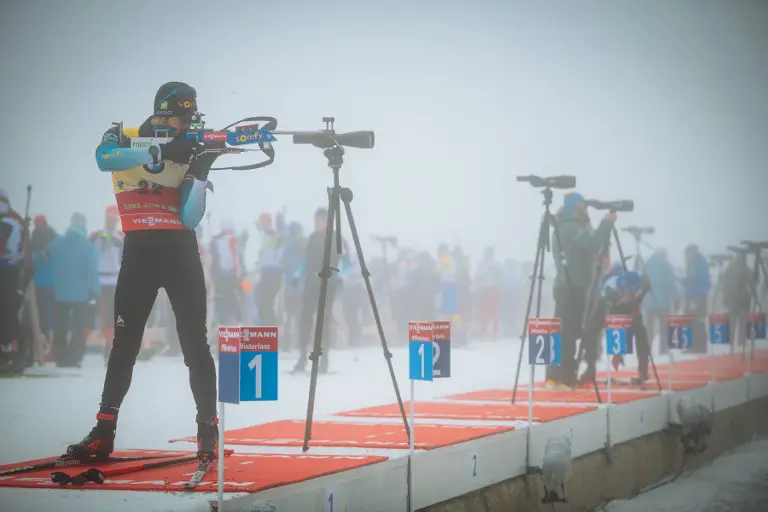 France's Martin Fourcade aims at the shooting range during the zeroing session ahead of the men Individual 20 km of the Biathlon world cup event in Pokljuka on December 5, 2018. - Competition has been cancelled and postponed due to dense fog for December 6, 2018. (Photo by Jure Makovec / AFP)