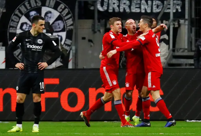Bayern Munich's Franck Ribery celebrates scoring their first goal with team mates