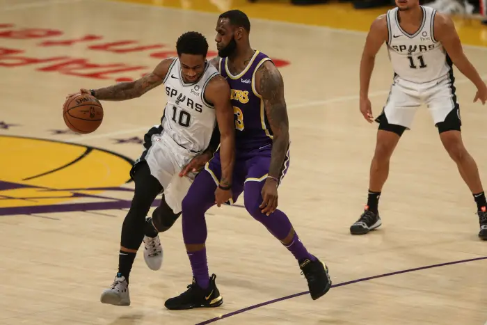 San Antonio Spurs Guard DeMar DeRozan (10) being guarded by Los Angeles Lakers Forward LeBron James (23)