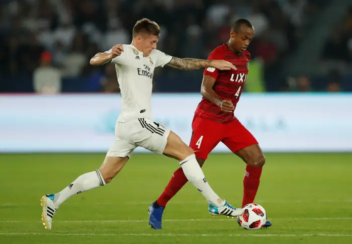 Soccer Football - Club World Cup - Semi-Final - Kashima Antlers v Real Madrid - Zayed Sports City Stadium, Abu Dhabi, United Arab Emirates - December 19, 2018  Kashima Antlers' Leo Silva in action with Real Madrid's Toni Kroos