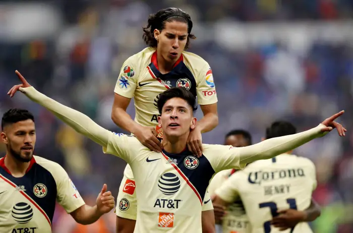 Soccer Football - Liga MX Final Second Leg - Cruz Azul v America, Azteca Stadium, Mexico City, Mexico- December 16, 2018   America's Edson Alvarez celebrates scoring their first goal with Diego Lainez