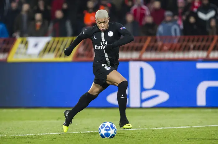 Kylian Mbappe of Paris Saint-Germain comes forward on the ball