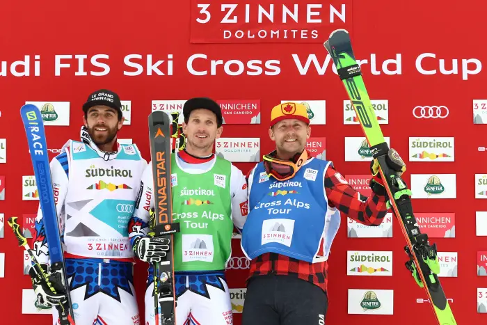 from left, Bastien Midol FRA, Jonathan Midol FRA, and Brady Leman CAN on the podium