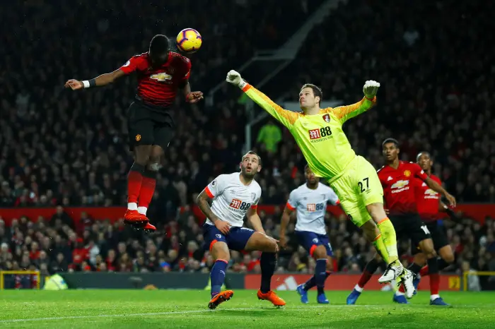 Soccer Football - Premier League - Manchester United v AFC Bournemouth - Old Trafford, Manchester, Britain - December 30, 2018  Manchester United's Paul Pogba scores their second goal past Bournemouth's Asmir Begovic