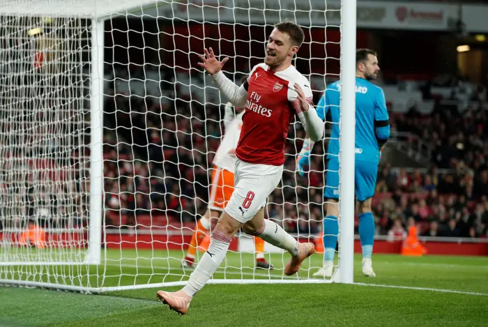 Arsenal's Aaron Ramsey reacts after a missed chance