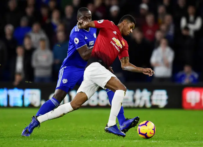 Manchester United's Marcus Rashford in action with Cardiff City's Sol Bamba