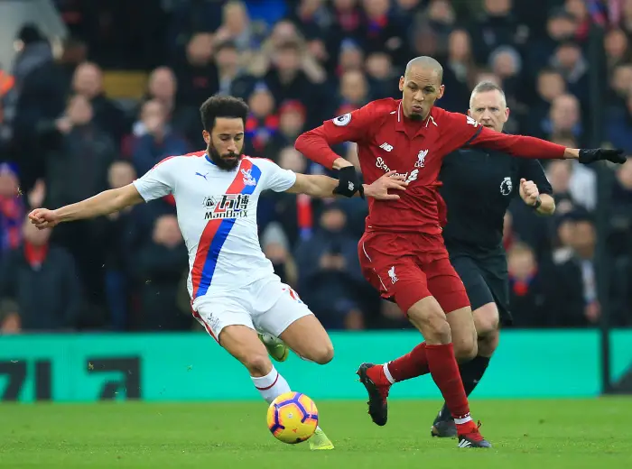 19th January 2019, Anfield, Liverpool, England; EPL Premier League football, Liverpool versus Crystal Palace; Andros Townsend of Crystal Palace and Fabinho of Liverpool compete for the ball