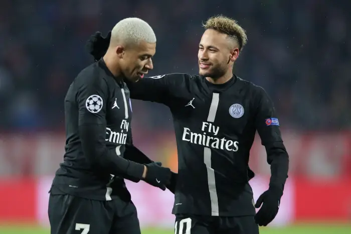 Paris St Germain's Kylian Mbappe with Neymar after the match