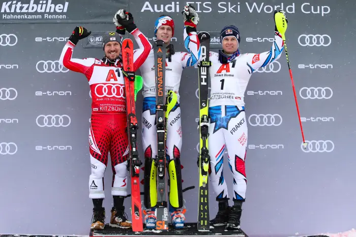 KITZBUEHEL,AUSTRIA,26.JAN.19 - ALPINE SKIING - FIS World Cup, Hahnenkamm-race, slalom, men, award ceremony. Image shows Marcel Hirscher (AUT), Clement Noel (FRA) and Alexis Pinturault (FRA).