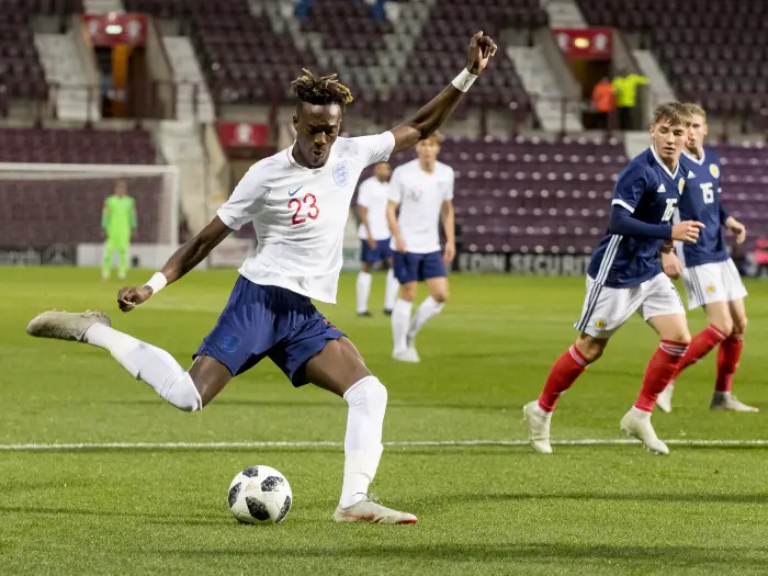 Tammy Abraham of England crosses into the box