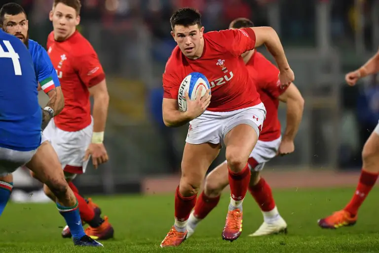 Wales' centre Owen Watkin runs on his way to score a try during the Six Nations rugby union tournament match between Italy and Wales at the Olympic stadium in Rome on February 9, 2019. (Photo by Andreas SOLARO / AFP)