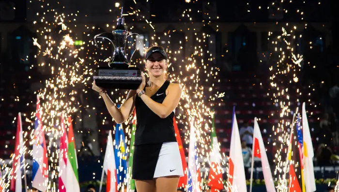 February 23, 2019 - Dubai, ARAB EMIRATES - Belinda Bencic of Switzerland poses with her champions trophy after winning the final of the 2019 Dubai Duty Free Tennis Championships WTA Premier 5 tennis tournament