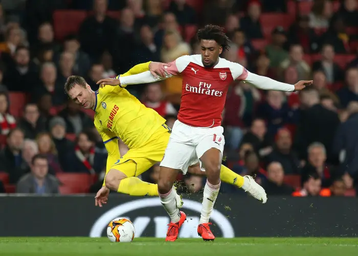 21st February 2019, Emirates Stadium, London, England; UEFA Europa League football, Arsenal versus BATE Borisov; Alex Iwobi of Arsenal holds off the challenge from Maksim Skavysh of BATE Borisov