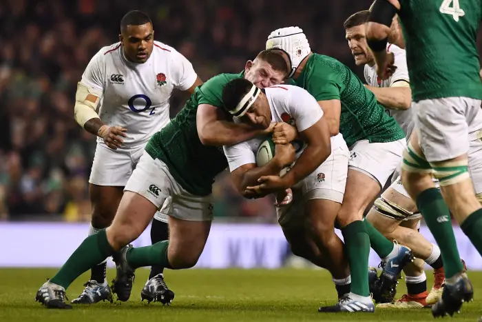 England's Mako Vunipola in action with Ireland's Tadhg Furlong and Rory Best
