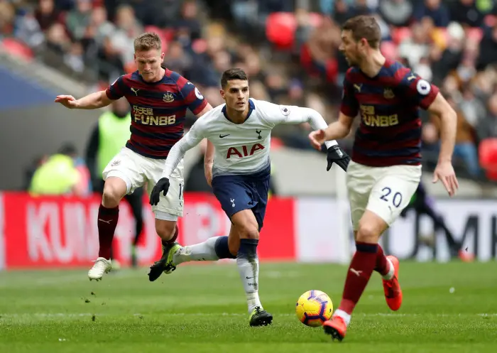 Tottenham's Erik Lamela in action with Newcastle United's Florian Lejeune and Matt Ritchie