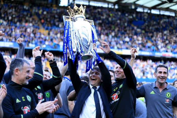 Chelsea manager Antonio Conte  lifts the Premier League trophy during the Premier League match between Chelsea and Sunderland at Stamford Bridge on May 21st 2017 in London, England.