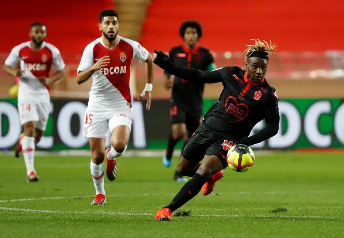 Nice's Allan Saint-Maximin in action with AS Monaco's Youssef Ait Bennasser