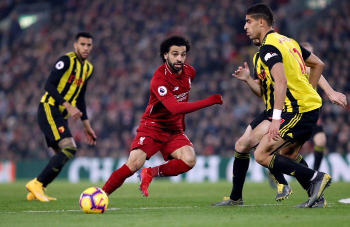 Soccer Football - Premier League - Liverpool v Watford - Anfield, Liverpool, Britain - February 27, 2019  Liverpool's Mohamed Salah in action with Watford's Adam Masina