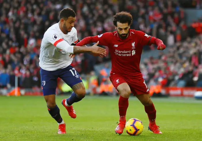 Soccer Football - Premier League - Liverpool v AFC Bournemouth - Anfield, Liverpool, Britain - February 9, 2019  Liverpool's Mohamed Salah in action with Bournemouth's Joshua King