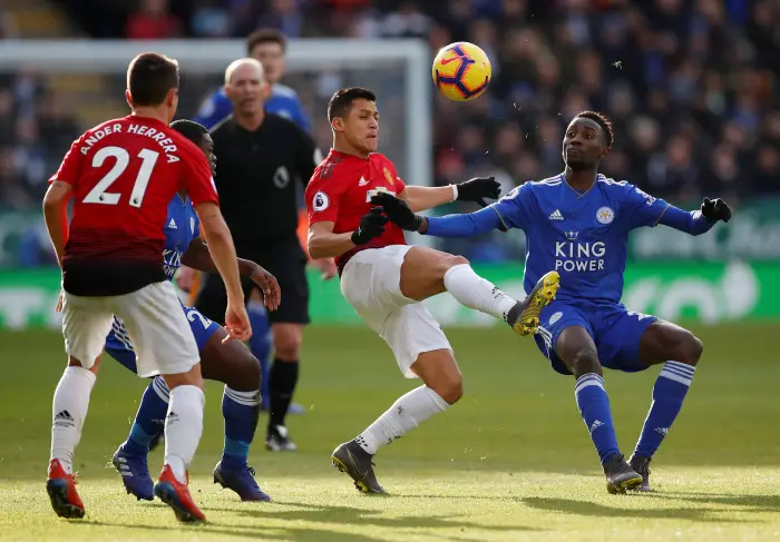 Manchester United's Alexis Sanchez in action with Leicester City's Wilfred Ndidi