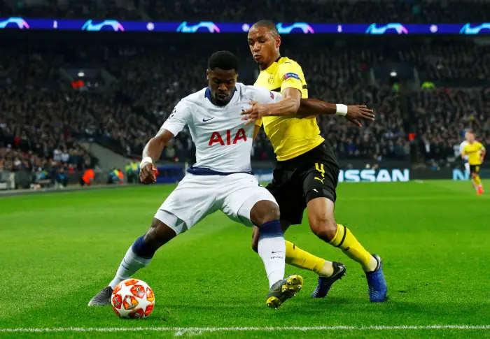 Tottenham's Serge Aurier in action with Borussia Dortmund's Abdou Diallo