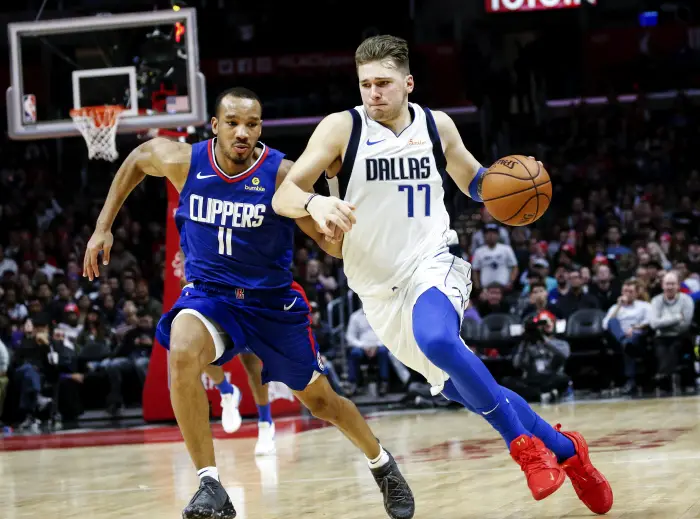 December 20, 2018 - Los Angeles, California, U.S - Dallas Mavericks' Luka Doncic (77) drives against Los Angeles ClippersÀ Avery Bradley (11) in an NBA basketball game between Los Angeles Clippers and Dallas Mavericks om Thursday, Dec. 20, 2018, in Los Angeles. The Clippers won 125-121.