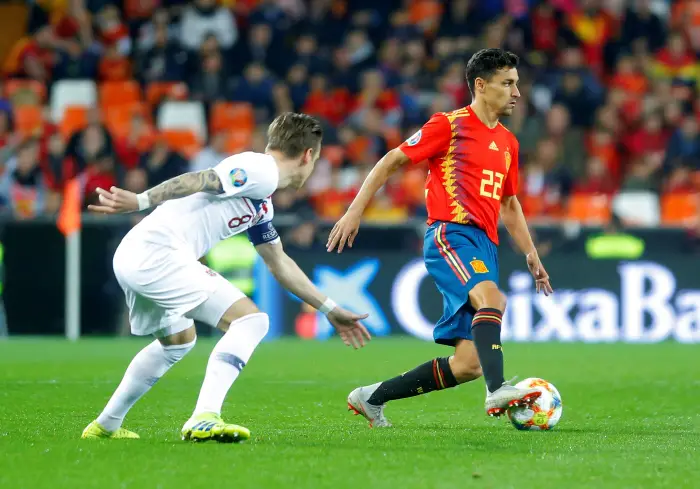 Spain's Jesus Navas in action with Norway's Stefan Johansen