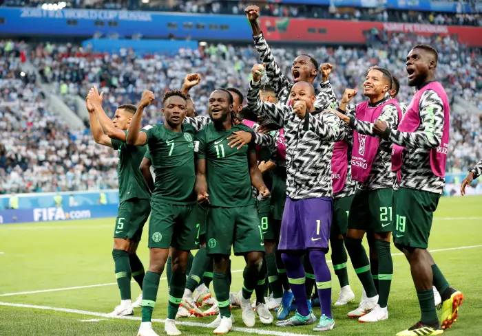 Soccer Football - World Cup - Group D - Nigeria vs Argentina - Saint Petersburg Stadium, Saint Petersburg, Russia - June 26, 2018   Nigeria's Victor Moses celebrates scoring their first goal with Ahmed Musa and team mates