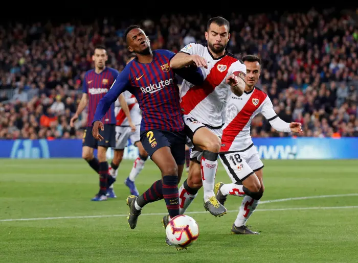 Soccer Football - La Liga Santander - FC Barcelona v Rayo Vallecano - Camp Nou, Barcelona, Spain - March 9, 2019  Barcelona's Nelson Semedo in action with Rayo Vallecano's Jordi Amat