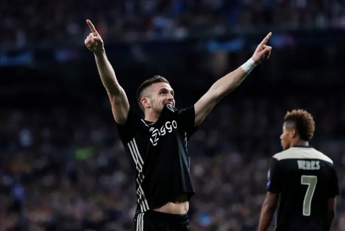 Soccer Football - Champions League - Round of 16 Second Leg - Real Madrid v Ajax Amsterdam - Santiago Bernabeu, Madrid, Spain - March 5, 2019  Ajax's Dusan Tadic celebrates scoring their third goal with David Neres