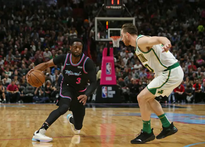 January 10, 2019 - Miami, FL, USA - The Miami Heat's Dwyane Wade (3) drives against the Boston Celtics' Gordon Hayward (20) in the third quarter at AmericanAirlines Arena in Miami on Thursday, Jan. 10, 2019. The Heat won, 115-99.