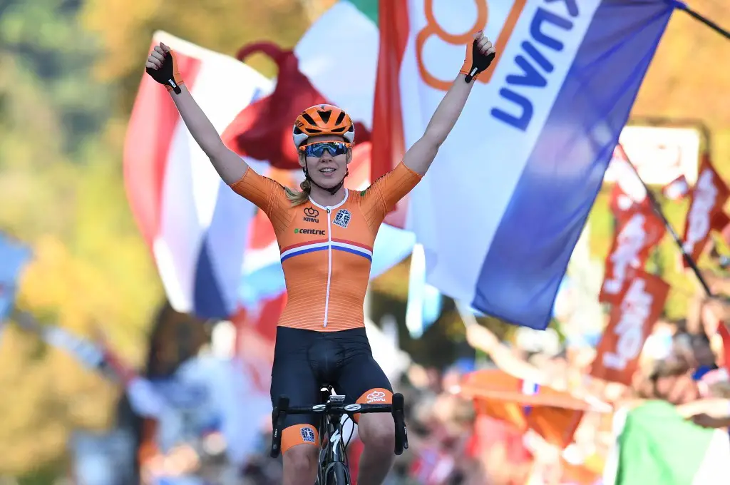 Netherland's Anna Van Der Breggen celebrates at the finish line after winning the Women's Elite road race of the 2018 UCI Road World Championships in Innsbruck, Austria on September 29, 2018. (Photo by Christof STACHE / AFP)